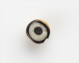 Eye-bead, with a lateral bore; the eyelet broken off, New Kingdom, 1550-1307 BCE. Creator: Unknown.