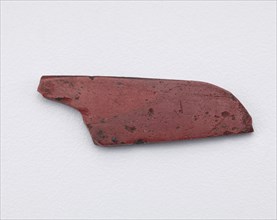 Part of an inlay: a wing form. Cut with a die, Ptolemaic Dynasty or Roman Period, 305 BCE-14 CE. Creator: Unknown.