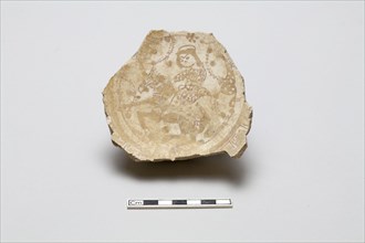 Fragmentary base of a bowl with image of a rider, early 13th century. Creator: Unknown.