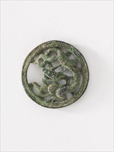 Costume ornament: dragon in roundel (pair with F1917.565), Goryeo period, 12th-13th century. Creator: Unknown.