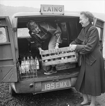 Loading a van, Newport Pagnell, Milton Keynes, 09/1958. Creator: John Laing plc.