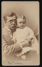 Portrait of William Young and Child, 1879. Creator: Samuel Montague Fassett.