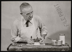 Frank Earl Holden Demonstrates Cutting into Mineral, January 18, 1951. Creator: United States National Museum Photographic Laboratory.