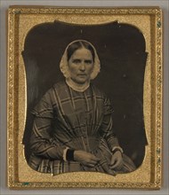 Untitled [portrait of a woman in a plaid dress], 1839/60.  Creator: Unknown.