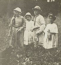Untitled (Flora, Elizabeth, Howard & Kitty in Lake George field), 1903/05. Creator: Alfred Stieglitz.