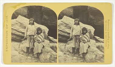 Navajo Brave and his Mother. The Navajo were formerly a warlike tribe until subdued by U.S..., 1873. Creator: Tim O'Sullivan.