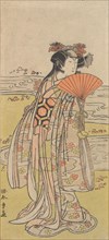 The Actor Segawa Kikunojo III as a Woman Standing near a Winding Stream, ca. 1777. Creator: Shunsho.