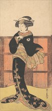 The Fourth Iwai Hanshiro as a Woman in a Black Kimono, ca. 1778 Creator: Katsukawa Shunko.