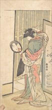 A Courtesan Looking at Her Reflection in a Hand Mirror, ca. 1787. Creator: Katsukawa Shun'ei.