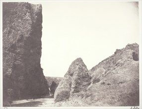 Ruisseau coulant entre une falaise et des rochers, 1854, printed 1978. Creator: Edouard Baldus.