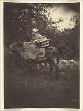 Female Peasant Riding Donkey, 1870. Creator: Giraudon's Artist.