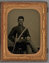 Untitled (Portrait of a Seated Soldier with Sabre), 1862. Creator: Samuel J. Miller.