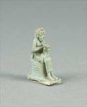 Amulet of Isis Holding Horus, Egypt, Late Period-Ptolemaic (7th to 1st centuries BCE). Creator: Unknown.