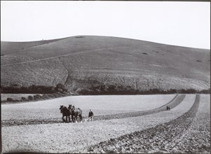 Ploughing under the shadow of the Dyke, 1930s. Creator: J Dixon Scott.