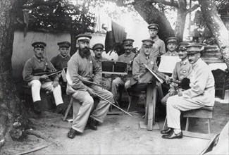 Members of a German Bando POW camp orchestra at Tokushima Prefecture, c. 1917. Creator: Anonymous.