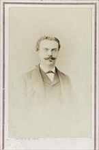 Portrait of Guy de Maupassant, c. 1880. Creator: Photo studio Witz & Cie.