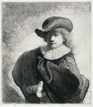 Self-portrait in a soft hat and embroidered cloak, 1631. Creator: Rembrandt van Rhijn (1606-1669).
