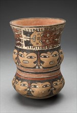 Curving Beaker with Rows of Abstract Human Faces, 180 B.C./A.D. 500. Creator: Unknown.