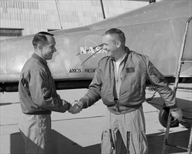 Fred Drinkwater congratulating Neil Armstrong, California, USA, February 1964.  Creator: Lee Jones.