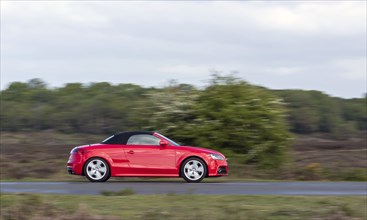 Audi TT cabriolet driving in New Forest. Creator: Unknown.