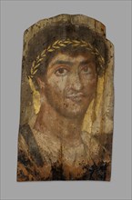 Mummy Portrait of a Man Wearing a Laurel Wreath, Fayum, Early to mid-2nd century. Creator: Unknown.