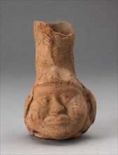 Heavily Eroded Miniature Jar in Form of a Human Head with Large Cheeks, 100 B.C./A.D. 500. Creator: Unknown.