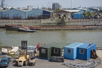 Trinity Buoy Wharf, Leamouth, Tower Hamlets, London, 2012. General view of the east side of Trinity Buoy Wharf from the west, showing containers on the quayside, and Bow Creek Wharf across the River L...