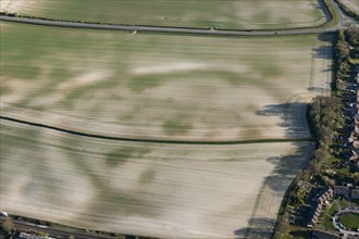 Mount Pleasant, a henge enclosure crop mark, with associated round barrow earthwork, known as the Conquer Barrow, near Dorchester, Dorset, 2015.