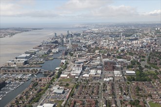 View from the Baltic Triangle Development Area and Historic Docks to the City Centre and mouth of the River Mersey, from the south east, Liverpool, 2015.