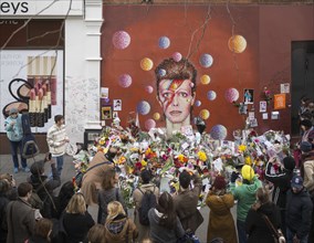 Mural of David Bowie, Morley's department store, Tunstall Road, Brixton, London, 2016. General view of the painted mural of musician and rock-star David Bowie on the north side of Morley's department ...