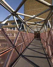 The Royal Borough of Kensington and Chelsea Depot, London, 2016. General view of the council depot and housing, looking south along the tubular steel walkway linking Broadwood Terrace and Chesterton S...