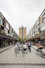 Queensway, looking towards The Towers, Stevenage, Hertfordshire, 2017. General view looking south along Queensway towards The Towers apartment block, with bicycles parked in the foreground.