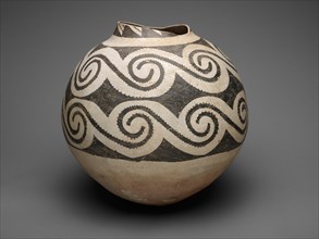 Storage Jar with Horizontal Bands of Interlocking Scrolls, A.D. 875/1130. Round ceramic jar with large black S-shaped geometric designs on cream ground.