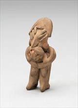 Standing Female Holding a Child in Her Arms, 500 B.C./300 B.C.