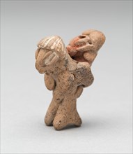 Figurine Depicting a Female Carrying a Child, 500 B.C./300 B.C.