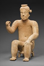 Seated Male Figure with One Arm Raised, A.D. 100/900.