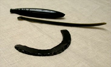 Obsidian Core, Blade, and Curved Neckpiece, c. A.D. 300.