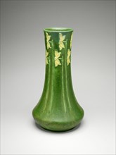 Vase, 1903/9. Japanese-influenced glazed earthenware vessel with daffodil motif. Design attributed to George Prentiss, decoration attributed to Eva Russell,