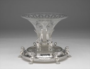 Centerpiece, c. 1880. Egyptian Revival tableware decoated with sphinxes.