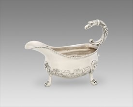 Sauce Boat, c. 1817/33. Bunches of grapes and vineleaves decoration, with handle in the shape of a bird of prey.