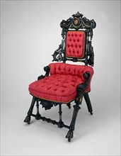 Armchair, patented in 1869. Upholstered chair, ebonized walnut with gilt decoration.
