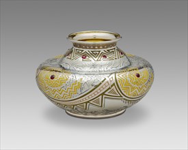 Pueblo Vase, 1893. Influenced by Native American Pueblo culture, silver inlaid with enamel, set with twelve faceted rubies. Designed by George Paulding Farnham.