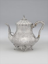 Hot Water Pot, 1850. Floral decoration with 'Almy' inscribed between repoussé trees.