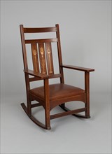 Rocking Chair, 1903. Oak with copper and bronze inlays. Designed by Harvey Ellis.