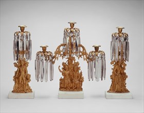 Girandoles, 1848/51. Bronze gilt candlesticks inspired by 'The Last of the Mohicans': Chief Chingachgook, Natty Bumppo, Unicas, Major Duncan Heyward, Cora Munro. Designed by Isaac F. Baker.