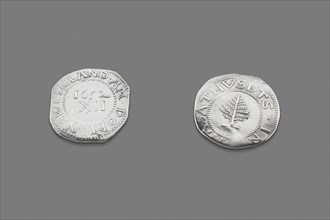 Pair of Pine Tree Shillings, 1663/82. Coins minted and circulated in the thirteen colonies of North America. The words NEW ENGLAND AN DOM on one side, IN MASATHVSETS and a pine tree on the other. Alth...