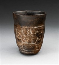 Blackware Cup with Abstract Faces Carved in Panels, A.D. 1000/1476.