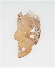 Carved Shell Depicting the Profile Face of Diety (Broken), A.D. 250/900.