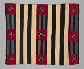Chief Blanket (Third Phase), c. 1880. A work made of wool, single interlocking and slit tapestry weaves with "lazy lines"; twined warp ends and selvages.
