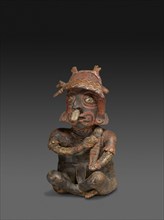 Seated Figure Playing a Rasp, c. A.D. 100.